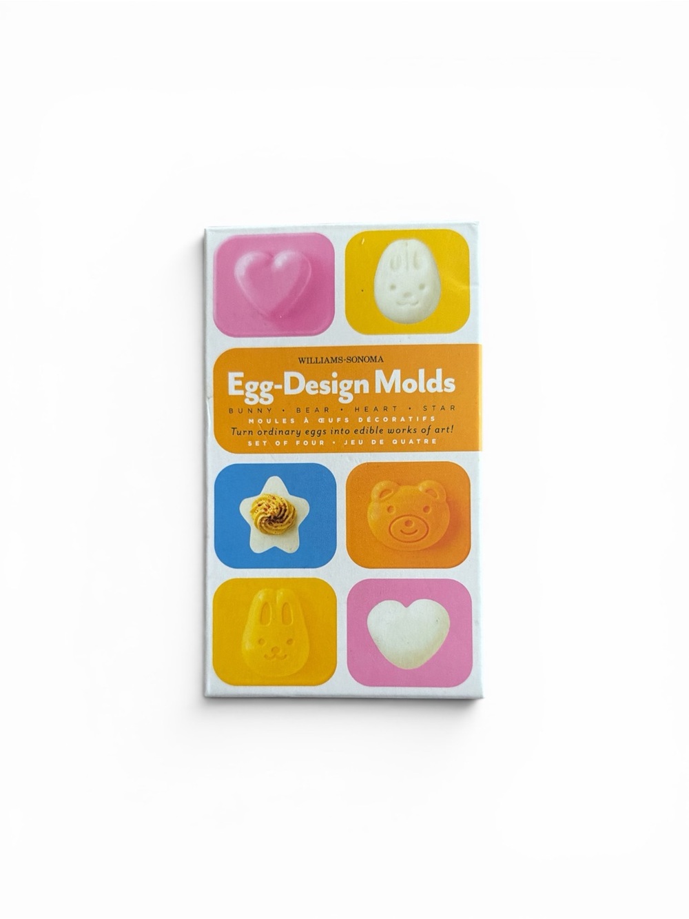 *FREE*With Purchase - Williams Sonoma Egg-Design Molds in Pink, Yellow, Orange.